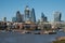 View of skyscrapers of Central business district. of London from Thames river