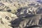 View of the slopes of the sandy mountains of the Judean Desert covered with spring vegetation