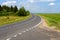 View of the small asphalt road in the countryside.