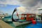 View of small boats in seaport. Indian Ocean, Maldives, Male. Beautiful blue sky with white clouds