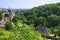 View of small city surrounded by green forest, Czech Republic