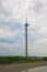 View of a small communications tower on a cloudy day