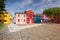 View of the small, cozy courtyard with colorful cottage / Burano, Venice/ The small yard with bright walls of houses