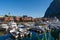 View on the small harbor of fishing village, Summer Lofoten islands, Norway.