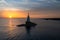 View of the small harbor lighthosue in Athopol on the Black Sea coast of Bulgaria at sunrise