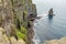 View of a small part of the coast of the Cliffs of Moher and the Branaunmore sea stack