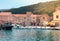 View of a small town center of the town Starigrad at Hvar island. Old small boats in the water as life goes on in a small village