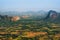 View small village in valley from top mountain on smog day