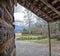 View of smoky mountain side from log cabin front porch