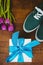 View of sneakers and blue gift