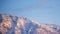 View of the snow Austrian Alps mountain with blue sky. Salzkammergut region.