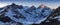 View of snow covered landscape with Dent Blanche mountains and Weisshorn mountain in the Swiss Alps near Zermatt. Panorama