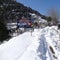 A view of snow covered Mughal Road after snowfall in Peer Panchal range in Poonch Jammu and Kashmir on Thrusday