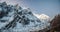 View of snow covered peak of Mount Manaslu during sunrise 8 156 meters with clouds in Himalayas, sunny day at Manaslu Glacier