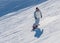 View of Snowboarder on the slopes of the Ski resort GrandVallira. Pyrenees mountains. Andorra