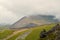 View from Snowdon Ranger path at a mountain train. Highest mountain in Wales. Snowdonia National Park.