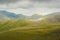 View from Snowdon Ranger path at a mountain train. Highest mountain in Wales. Snowdonia National Park.