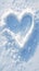 view Snowy love note Heart drawn in the snow, a romantic gesture