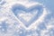 view Snowy love note Heart drawn in the snow, a romantic gesture