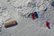 View of a snowy plain with wooden park benches and several sleighs and plastic children`s bobbing the joy of a winter sunny day un