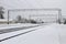 View on the snowy railroad tracks on winter