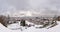 View from snowy Schlossberg with rose garden to city Graz