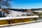 View from the snowy St. George ski jump to Winterberg in the Hochsauerland district