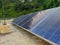 A view of solar pannel on a house roof.