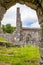 A view through a sone doorway of the abanoned ruins of Killone Abbey that was built in 1190 and sits on the banks of the Killone