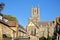 View of the South part of the Cathedral of Ely in Cambridgeshire, with medieval houses in the foreground