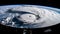 View from the space station of hurricane on planet Earth. Hurricane manifests as spiral formed by powerful clouds and stormy