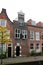 View at a special old house facade and entrance and rooftop in leiden south holland netherlands
