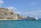 View of Spinalonga fortress and tourist cruise boats, Crete, Greece