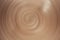 View of spiral lines of raw clay in the ceramic plate, abstract background of infinity with copy space