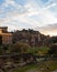 View of a sprawling cityscape and ruins in the ancient city of Rome, Italy