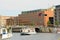 View of Spree River on sunny summer with city sightseeing tour cruise boats and crowd of people on bridge