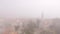 View of the square in front of the citadel of the old town of Budva in the fog