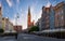 View of square and street named Long Lane with historic Gdansk Main Town Hall