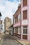 View of a St Clement churchl down a street in Hastings, UK