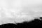 View of St. Francis papal church in Assisi Umbria, Italy in the middle of lifting morning fog