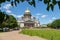 View of St. Isaac`s Cathedral from the side of the square and the green park in the spring sunny day