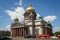 View of St. Isaac`s Cathedral from the side of the square on a sunny spring day