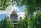 View of St. Isaac`s Cathedral through the trees of the Alexander garden