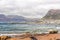 View from St James beach over Kalk Bay towards recreational harbour and breakwater lighthouse built in 1919  in |False Bay, Cape