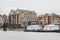 View of St. John`s Wharf, a warehouse converted into residential flat, from River Thames, London, UK