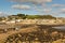 View from St Michaels Mount to Marazion Cornwall with people crossing the causeway