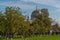 View of St. Nicholas Naval Cathedral through the Apple orchard of the Kronstadt Admiralty Park-Museum