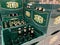 View on stacked green Jever beer crates in german supermarket