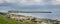 A view of Staffin island and Staffin harbour. Garrafad bay and An Corran Beach.  fishing boat and cottage