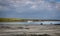 A view of Staffin island and Staffin harbour. Garrafad bay and An Corran Beach.  fishing boat and cottage